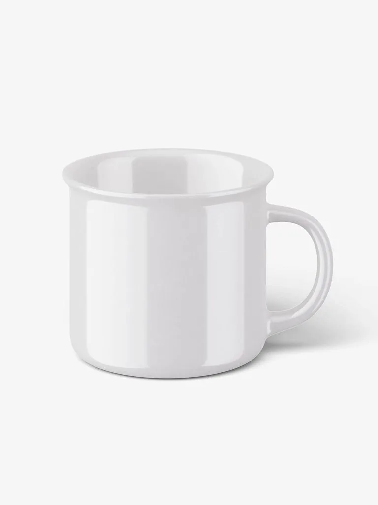Glossy white ceramic camp-style mug with a right-side handle on a pale background