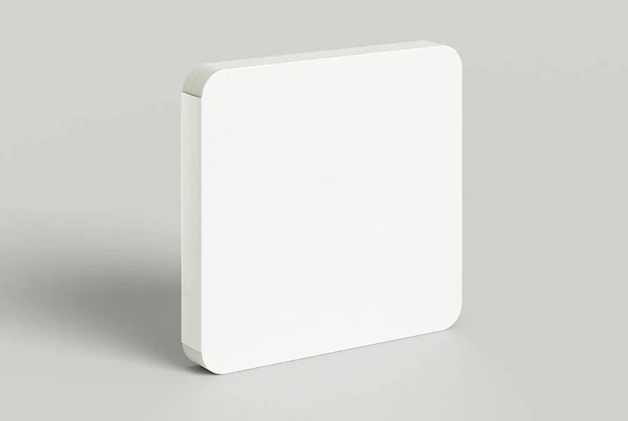 A blank square white board book standing upright at a slight angle against a light gray background.