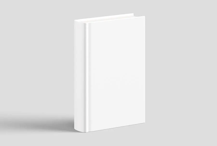 Plain white thick hardcover book standing upright at a slight angle on a gray surface, with its spine visible and shadow cast left.